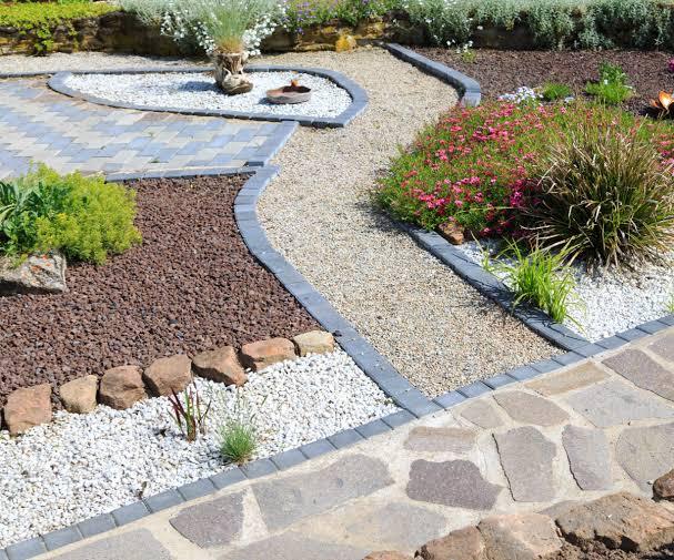 Landscaped garden with paving, gravel beds and planting